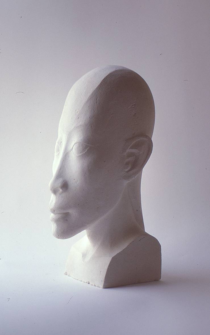 Être, 14"h x w5"w x 8"d, limestone. sculpture Être