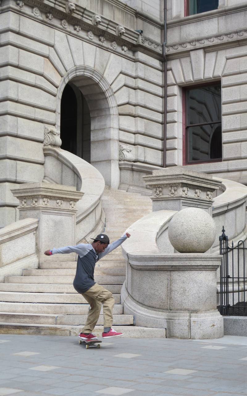 photo- skateboarder at Worcester City Hall On the Steps